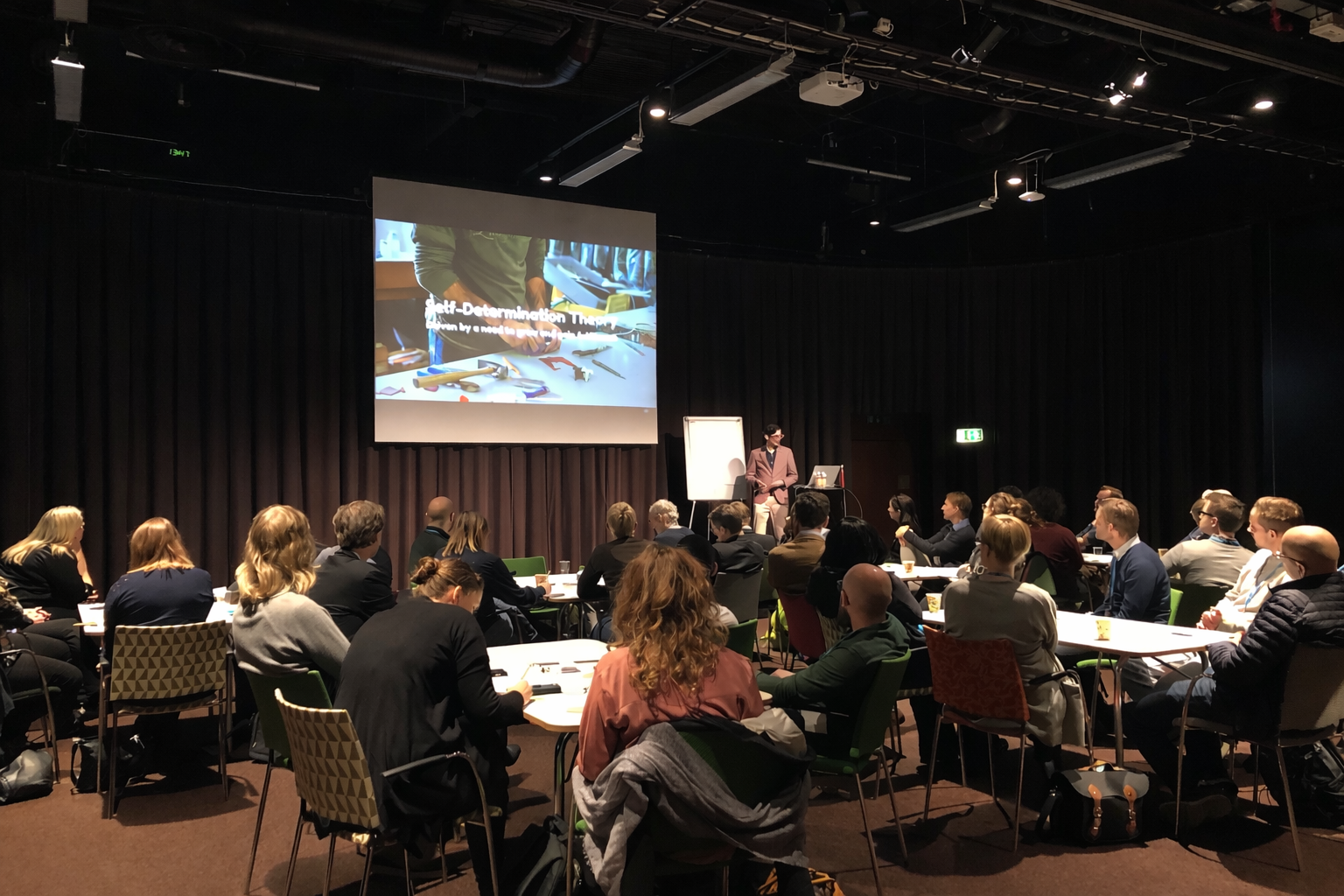 Zac running a workshop with participants
